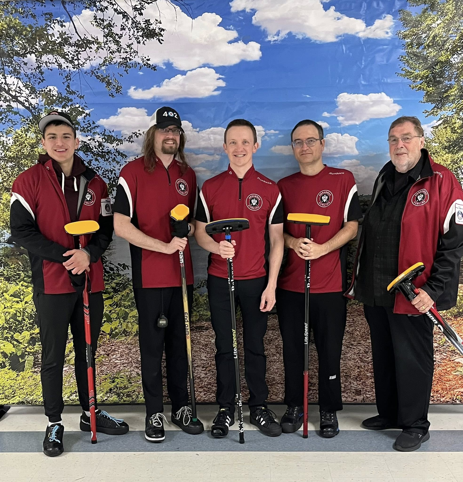 May be an image of 5 people, people golfing, track and field, dartboard and text